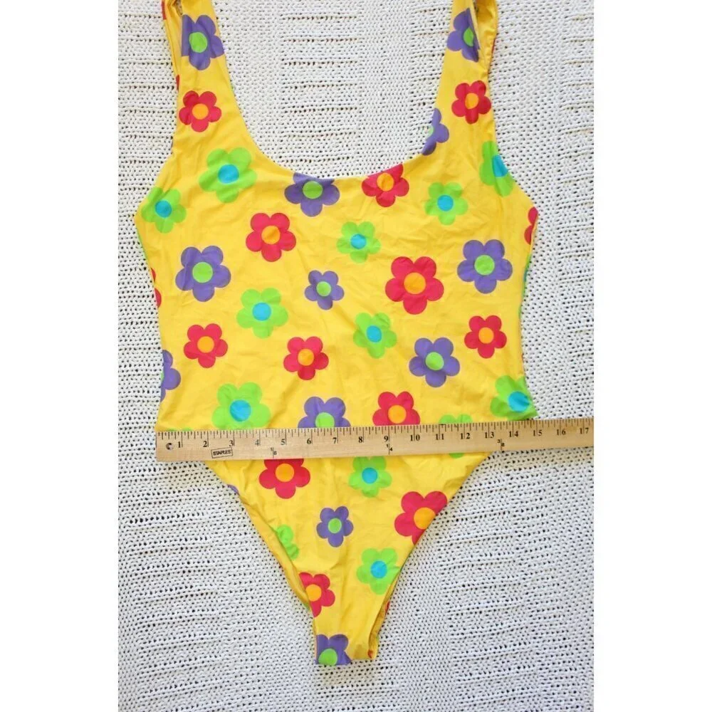 WeWoreWhat Yellow floral print swimsuit One piece open back Summer Size XL?
